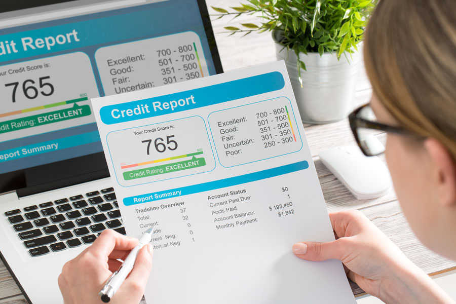 Lenders look at a borrower's credit score, number of open accounts, payment history, type of credit borrowed and a series of other factors when determining what level of risk to access to each lending scenario. File photo: REDPIXEL.PL, Shutter Stock, licensed.